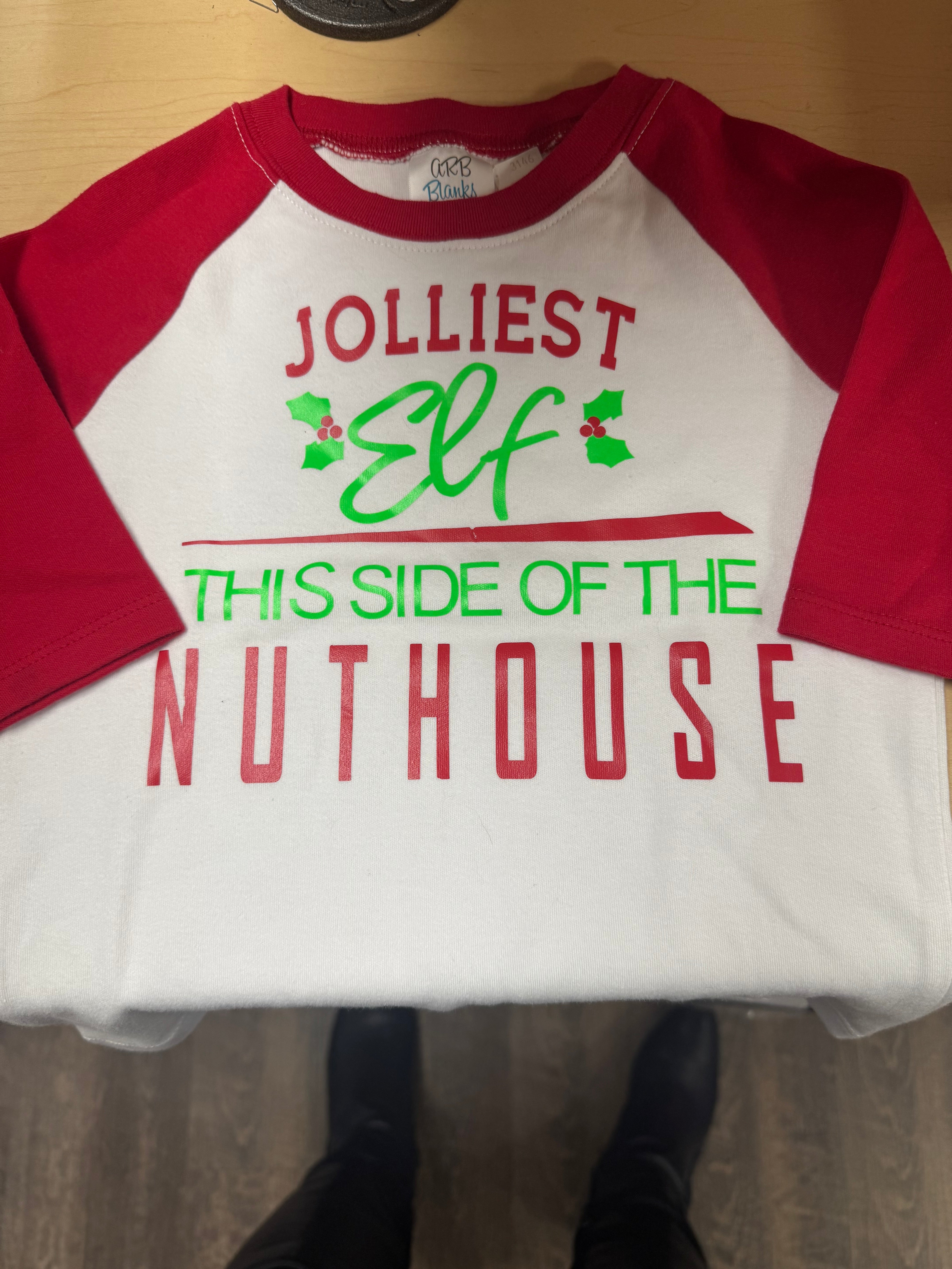 Jolliest Elf This Side of the Nuthouse Kids Raglan