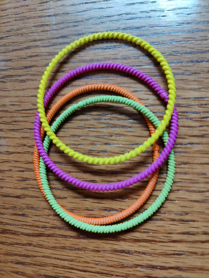 B #226 Stretch (6) Neon Painted Steel Twisted 7 inch