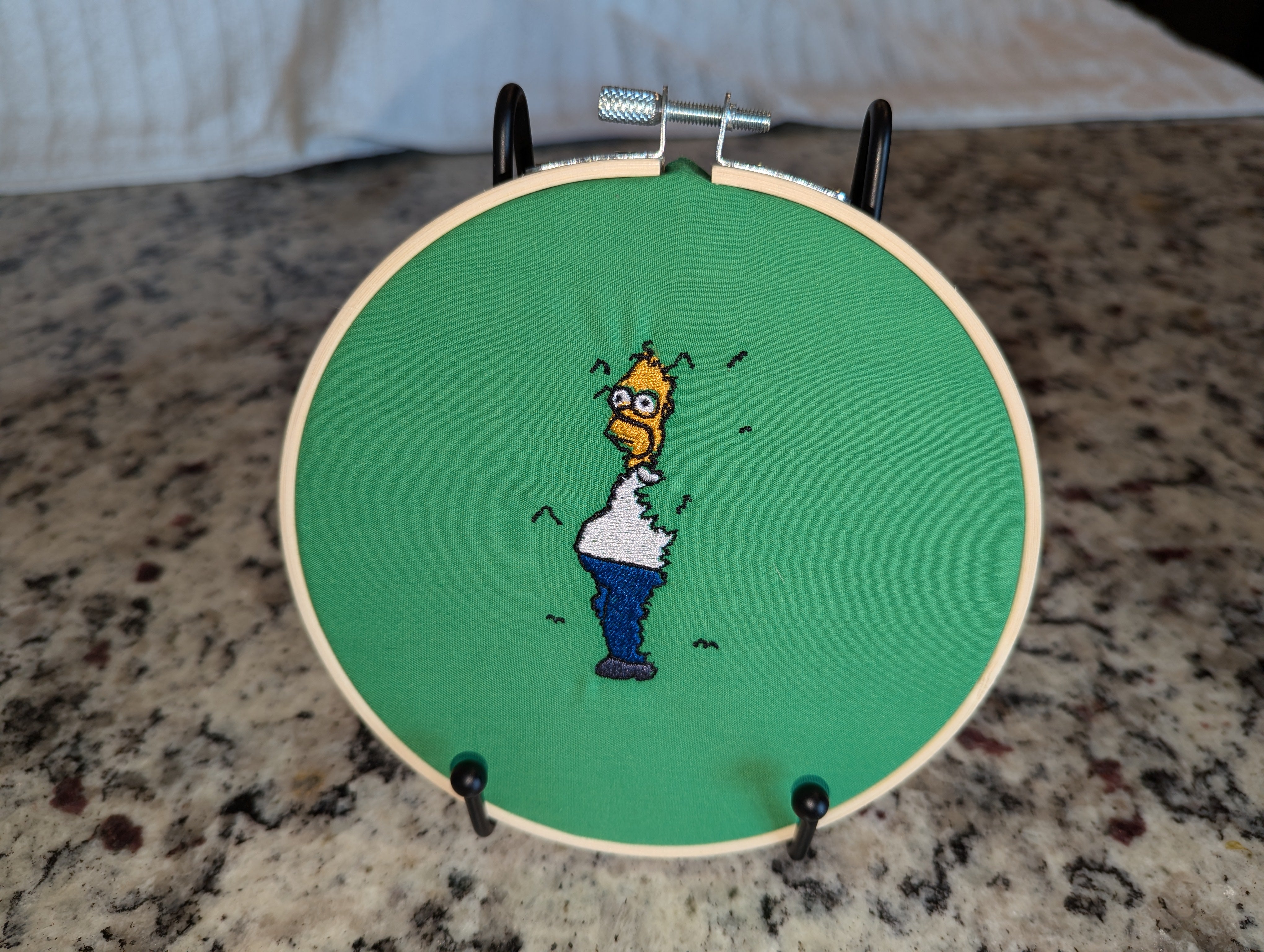 Homer in the Bushes Embroidered Wall Hanger