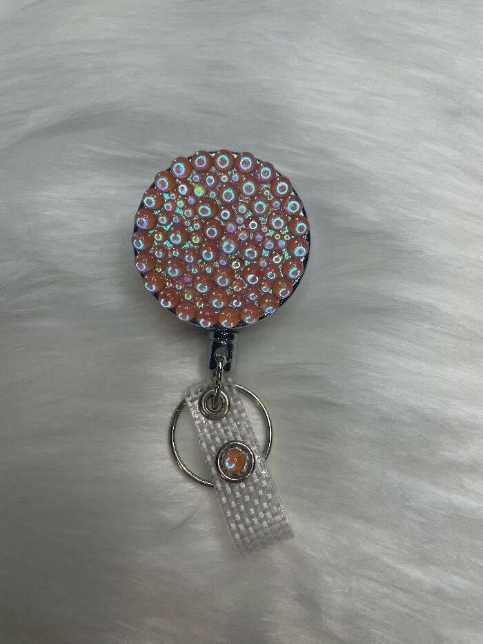 Rhinestone Badge Reel, Orange/Pink