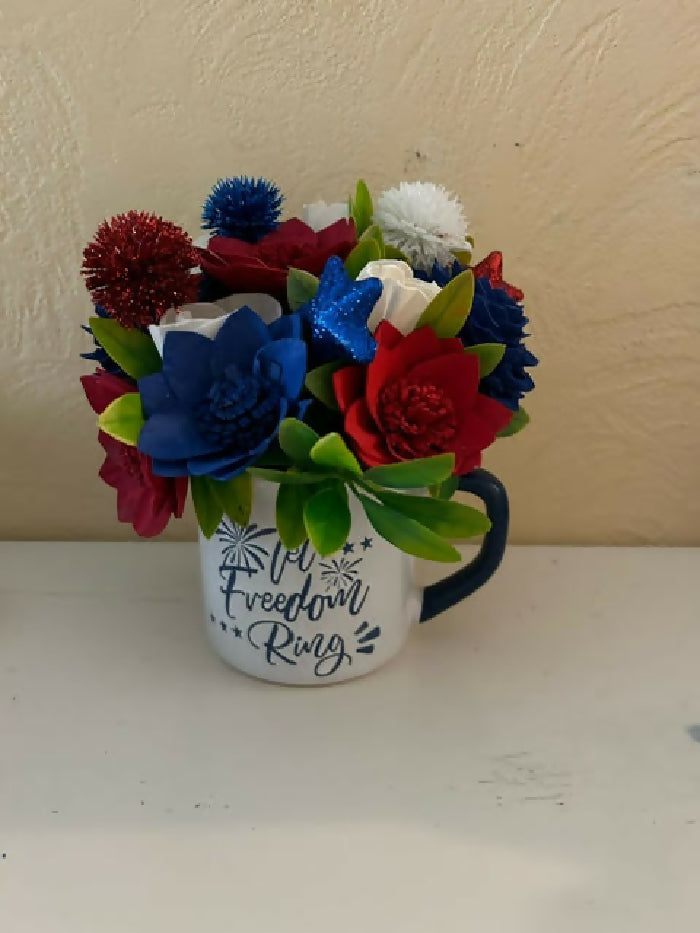 TAS-31 Let Freedom Ring cup, green filler, deep red, natural and Navy Sola Wood flowers.