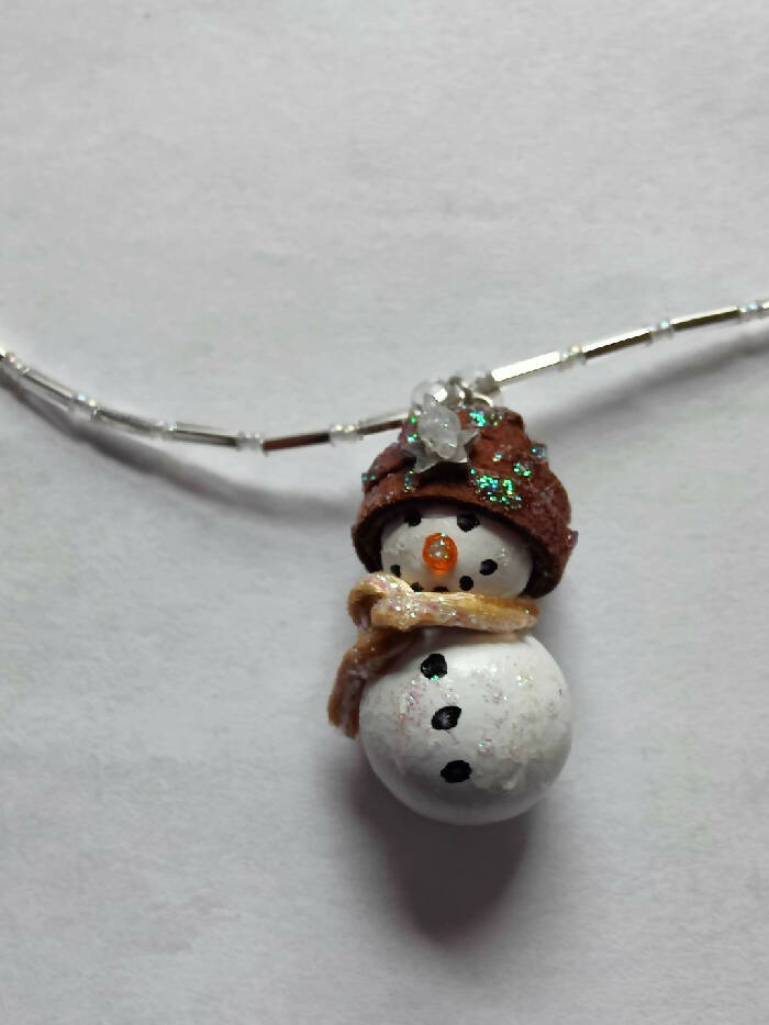 CHN #153 Snowman & 18-1/2 inch. Silver Tube Beads